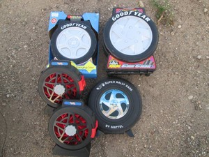Collection of Goodyear tire and hot wheels rally cases