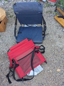 (2) padded folding stadium chairs