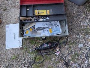 Dremel multi-pro with accessories in a Plano tacklebox