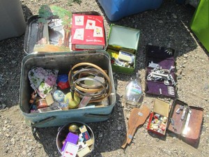Vintage picnic tin with a variety of desk top misc