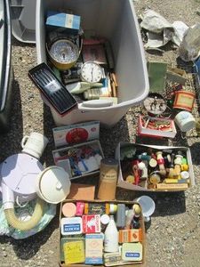 Covered Tote holding a huge array of personal care supplies, glassware, tins and more