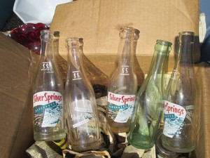 Vintage glass soda advertisement bottles