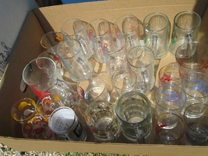 Collection of assorted vintage glass cups, tankard and other glassware