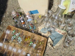 Vintage nautical themed glassware with various childrens show themed glassware