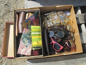 Large assortment of vintage eyeglasses and cases