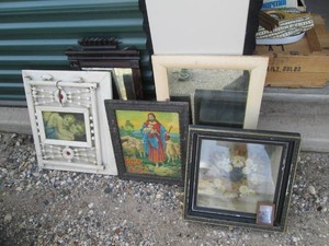 Variety of vintage mirrors and wall decor