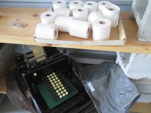 Vintage Burroughs adding machine with spare adding machine tape