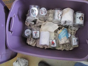 Large collection of Norman Rockwell Saturday Evening Post themed glassware in a covered tote