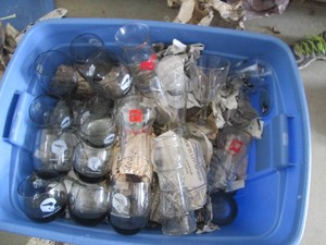 Massive assortment of vintage glassware including NFL, Various restaurant and soda brands, depression Era stemware and more in a covered tote
