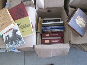 Large box of assorted atlases, law books, gardens around the globe and other reading materials