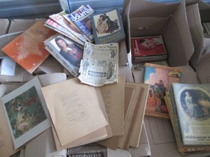 Vintage Montgomery Wards catalogs, true conlfessions magazines and other reading materials