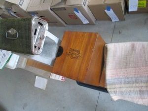 Vintage wood paper sorter, metal framed foot warmer and rug