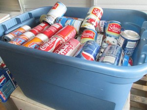 Covered Tote containing a wide variety of vintage beer and soda collector cans