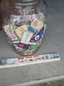 Large glass jar with a huge variety of matchbooks