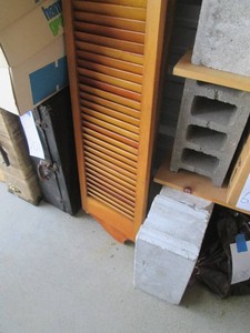 Variety of wood planks, cinder blocks and window shutters