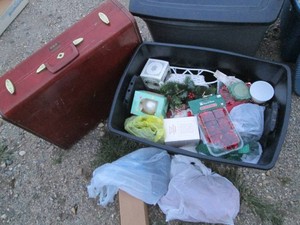 Vintage leather Suitcase plus Toltec of assorted vintage Christmas ornaments and decor
