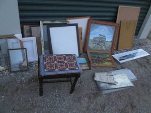 Vintage wood stool with embroidered seat, vintage picture frames and wall decor