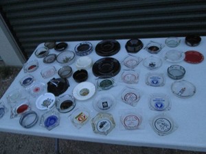 Collection of vintage glass and plastic ashtrays