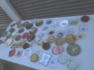 Large variety of glass and metal vintage ashtrays