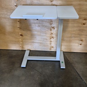 rolling over the bed table