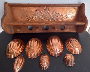 Copper Decorated Shelf and Copper Tone Molds