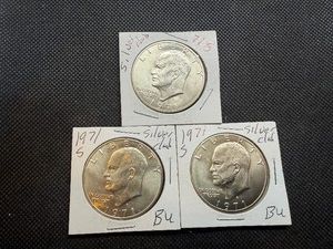 Three 1971 S Ike Dollars, Two Marked BU When Purchased