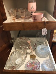 Assorted clear and pink glassware, rose perfume bottle, stemware, serving dishes 2 shelves of