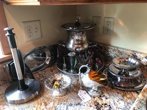 Metalsilverplated serving dishes, bells, vase with flower frog Oneida, England and others plastic grapes