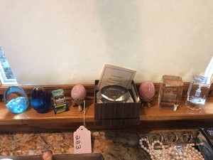 Paperweights, quartz eggs with holders