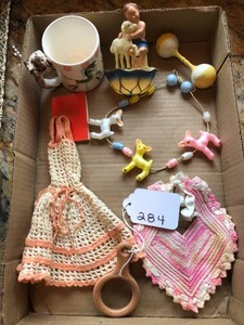 Childs cup, doilies, rattles