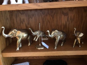 Elephant figurines and brass elephant, glasses