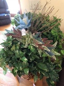 Artificial greenery and baskets