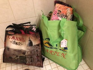 Assorted reusable shopping bags and other bags