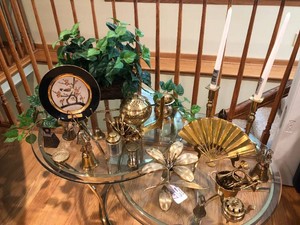 Assorted decorative items and artificial plant