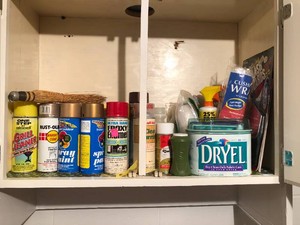 Spray paint, Dryel, splash guards, lightbulbs, batteries, cords and more all in 2 cupboards and box
