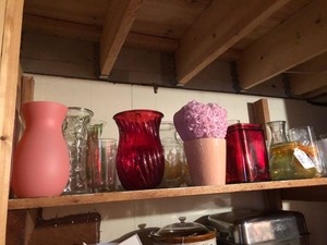 Assorted vases all on top shelf