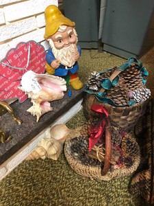 Baskets, pinecones, seashells, gnome