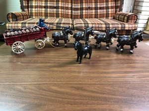 Cast iron horse drawn wagon and Beauty bank