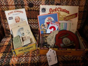 Military pins and buttons, marbles, metal ash tray, postcards