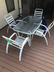 Patio table, 4 chairs, cushions, 2 non matching chairs, no umbrella