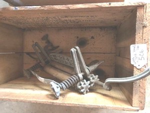 Acme wringer in wood box with piano rolls