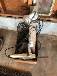 Remmington electric saw with treble light and cords