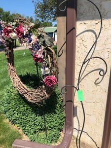 2 shepherds hooks with grape vine wreath