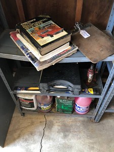 Chilton manual with jack and signs, anti freeze including the metal shelf