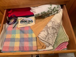 Tablecloths and aprons all in drawer