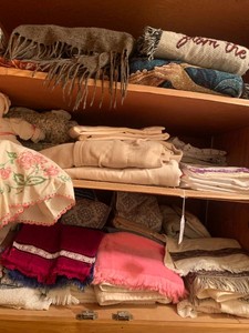 Blankets, sheet sets, towels all on 3 shelves