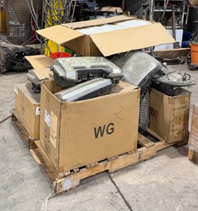 Pallet of headlights and mirrors for Fords