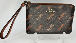 Coach New York Horse and Carriage Motif Signature Canvas Wristlet