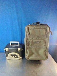 Carry on luggage and a cooler with built in radio