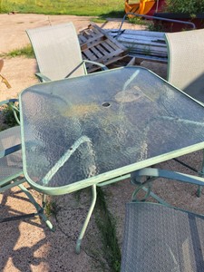 Glass top 5 piece swivel counter hight patio set